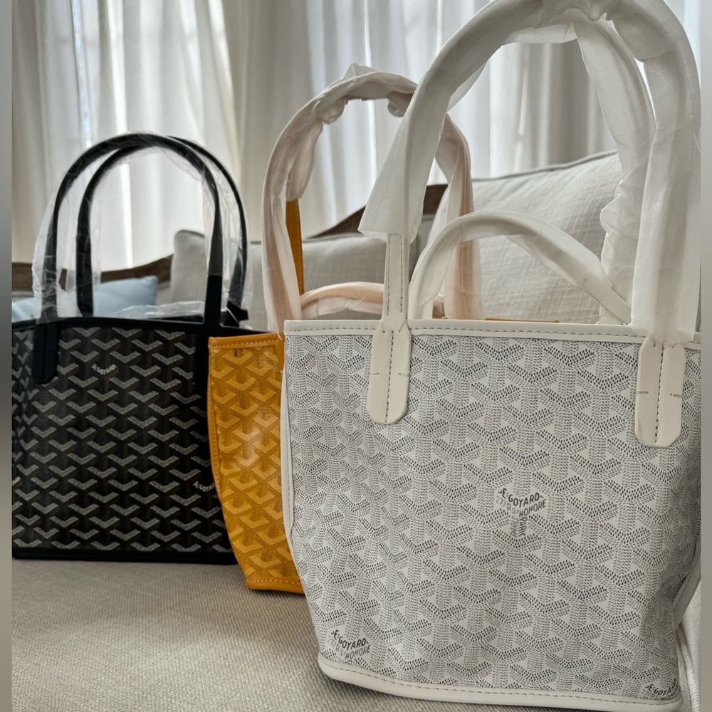 GOYARD
Goyardine  Mini Anjou Black, White and Yellow